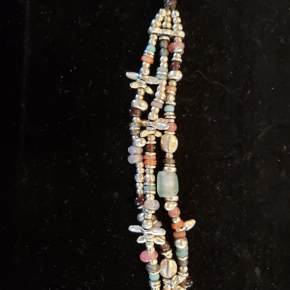 Uno de 50 "3 STRAND WONDER"  Bracelet. Gently Used